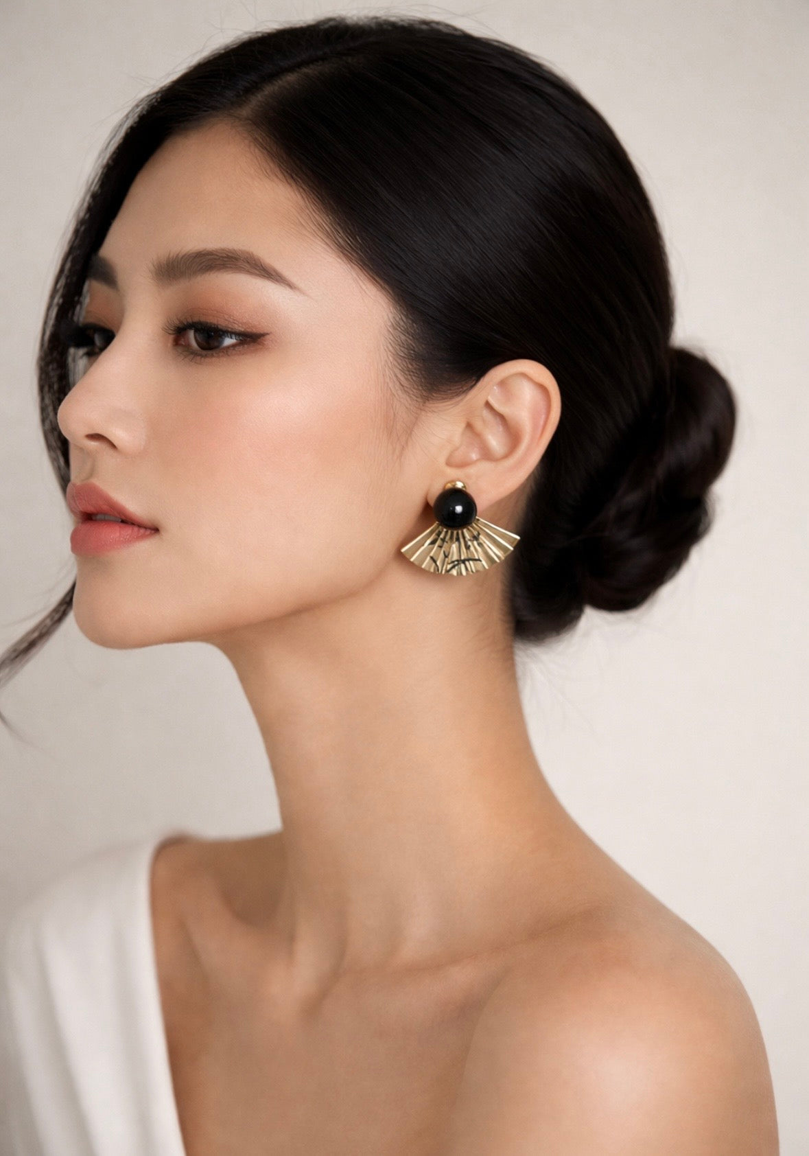 Do Fashion Better golden and black fan earrings
